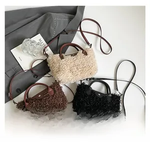 Detailed top view of plush dumpling bags in beige, coffee, and black with leather straps