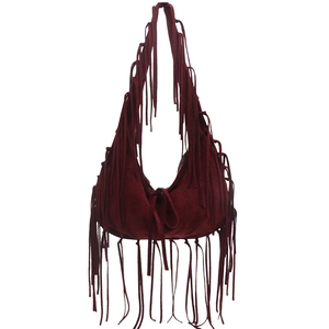 Deep red bohemian suede tassel tote bag with long fringe detailing and soft shoulder strap