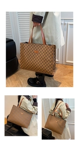 Detail view of the vintage tote bag showing geometric patterns and shoulder strap