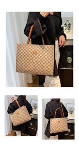 Detail of vintage geometric print tote bag with orange logo and leather handles