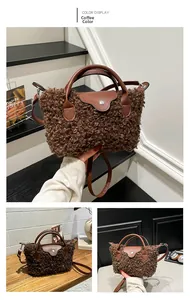 Detail of coffee brown plush tote bag with faux fur texture and leather handle