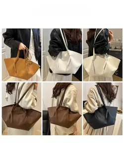 Detailed views of leather tote bags in multiple colors with knot shoulder strap design