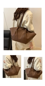 Detail of vintage brown tote bag showing premium lychee grain leather texture and knot strap