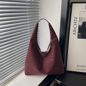 Vintage burgundy leopard print hobo shoulder bag with matte suede texture