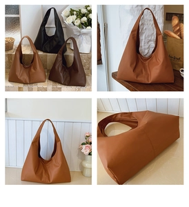 Detailed view of the large semi-moon hobo bag in black, brown and caramel finishes
