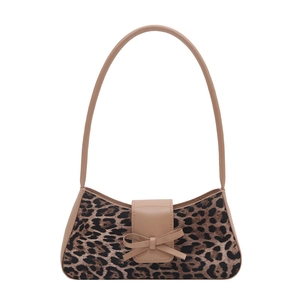 Fashionable leopard print shoulder bag with a brown flap and elegant bow decoration