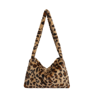 Faux fur leopard print shoulder bag with spacious interior and soft plush texture