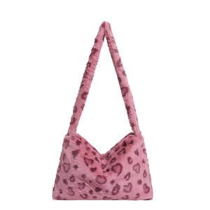 Pink plush faux fur shoulder bag with leopard heart pattern and soft crossbody strap