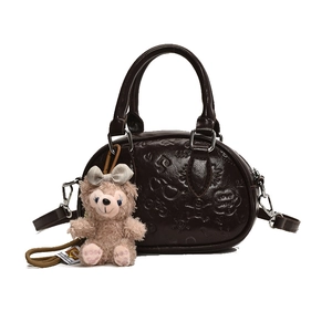 Sac à bandoulière en similicuir marron foncé avec gaufrage dessin et ours en peluche