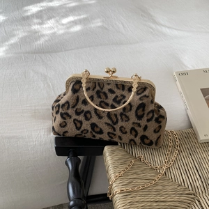 Retro leopard print faux fur handbag with gold frame closure and chain strap
