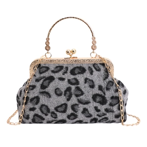 Vintage leopard print shell bag with faux fur, gold kiss lock and floral chain strap