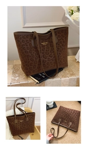 Detail of leopard print bucket bag featuring gold fashion typography and premium texture