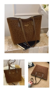 Detail of leopard print tote bag with gold fashion lettering and premium velvet texture