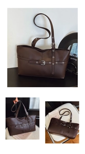 Detailed view of dark brown faux leather tote with silver eyelets and buckle accents