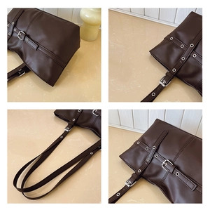 Detailed macro view of dark brown tote bag with silver metal eyelets and buckled straps