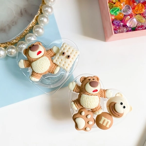 Detail of heart-shaped storage cases with 3D cartoon bear and candy ornaments