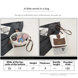 Tabella delle taglie con misure per borsa a secchiello bicolore e tracolla da 120 cm