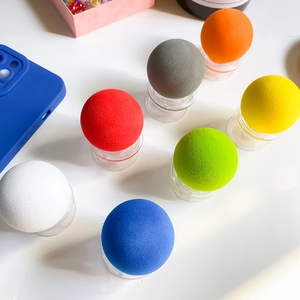 Detail showing various colorful spherical phone sockets with a matte textured surface