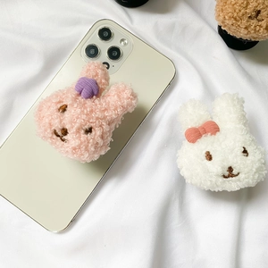 Cute bunny plush expanding cell phone grip in pink and white faux lamb wool
