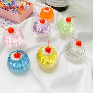 Colorful translucent cherry jelly phone grip set on white fabric, high-quality aesthetic