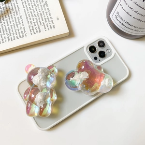 3D laser cloud bear cell phone socket grip with iridescent finish on a white phone case