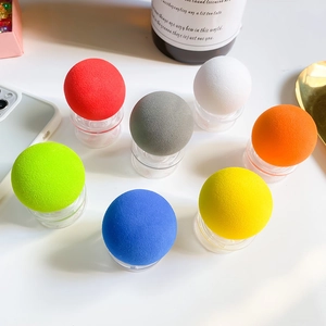 Spherical phone socket grips in seven solid colors with clear base for desk stand