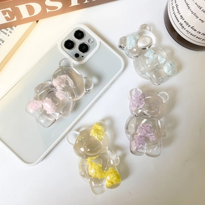 Détails de quatre supports de téléphone ours colorés avec un remplissage en résine