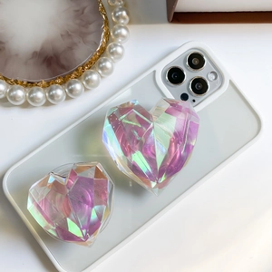 Dettaglio del supporto per telefono a cuore iridescente con effetto gradiente laser