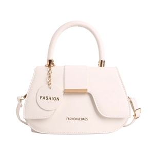 Minimalist beige saddle shoulder bag with golden hardware and fashion lettering