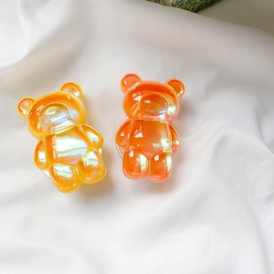 Gros plan de supports de téléphone ours mignons avec finition dégradé aurore