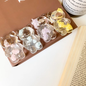 Lot de quatre supports de téléphone ours transparents avec des fleurs colorées à l'intérieur