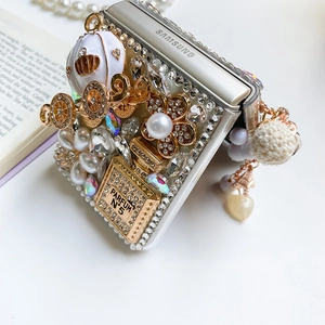 Detail of luxury rhinestone phone case with pearl perfume bottle for Samsung Z Flip