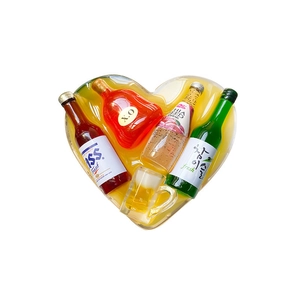 Heart-shaped resin phone grip with miniature beer, soju, and liquor bottle models inside