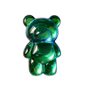Support de téléphone ours vert émeraude translucide avec texture brillante sur fond blanc
