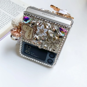 Detail of luxury rhinestone phone case for Galaxy Z Flip with floral crystal charms