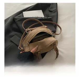 Interior view showing the large storage capacity for a phone and long wallet in this bag