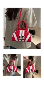 Macro view of red and white striped semi-circle crossbody bag with numeric 96 design