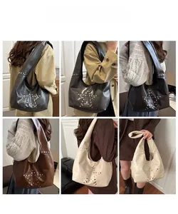 Detail of hobo bag with star rivet patterns shown in black, brown, and cream colors