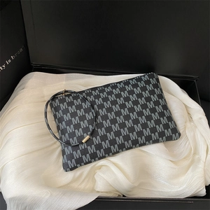 Chic dark grey envelope clutch with monogram print and golden wristlet in a luxury gift box
