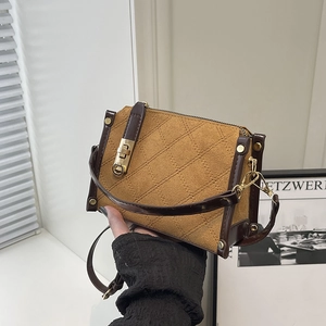 Chic quilted suede crossbody bag in camel and coffee brown with gold hardware