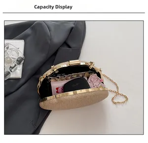 Champagne gold evening bag interior showing capacity for phone, cards and cosmetics