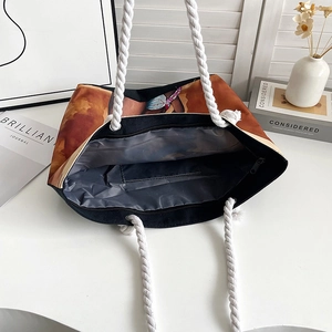 Internal view of large capacity canvas beach bag with zipper pocket and rope handles