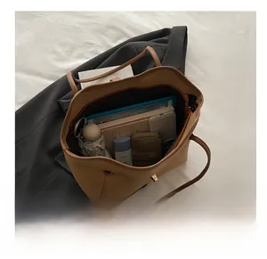 Detailed interior of the large litchi grain tote bag showing spacious storage capacity