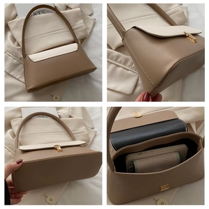 Detail view of contrast color shoulder bag stitching and interior capacity