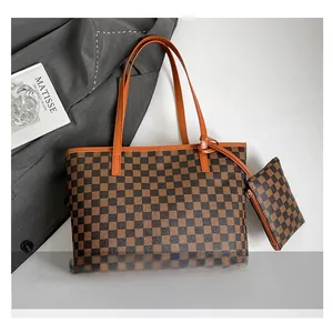 Detail view of coffee brown checkered tote bag with matching small coin purse