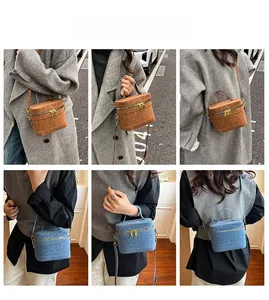 Detailansichten der Box-Taschen mit Leopardenmuster in Braun und Blau mit Gold-Elementen
