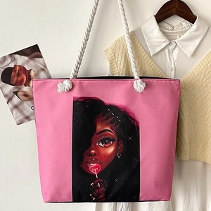Pink canvas tote bag featuring a stylish female illustration with rope handles
