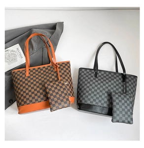Detail view of checkerboard tote bag set featuring large shoulder bag and small pouch