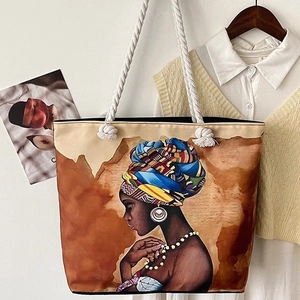 Classic canvas tote bag featuring African female portrait art and durable white rope handles