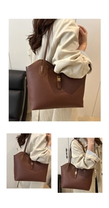Detailed view of dark brown litchi textured tote bag with shoulder straps and gold buckle
